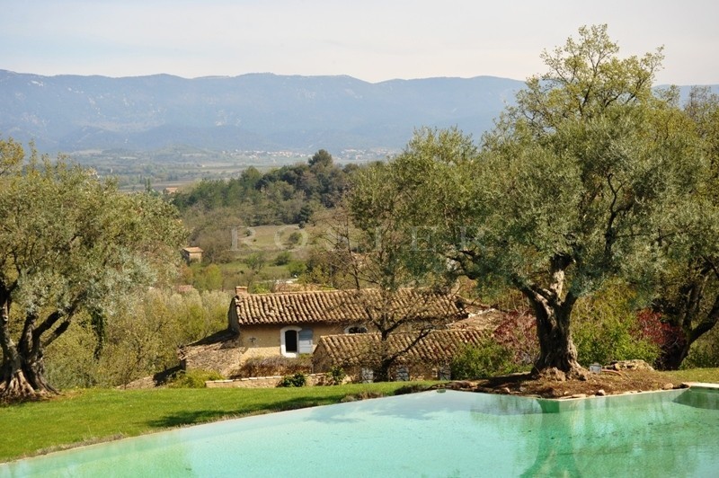 Luberon, renovated farmhouse with approximately 300 m² of living area sits on 7 hectares of land