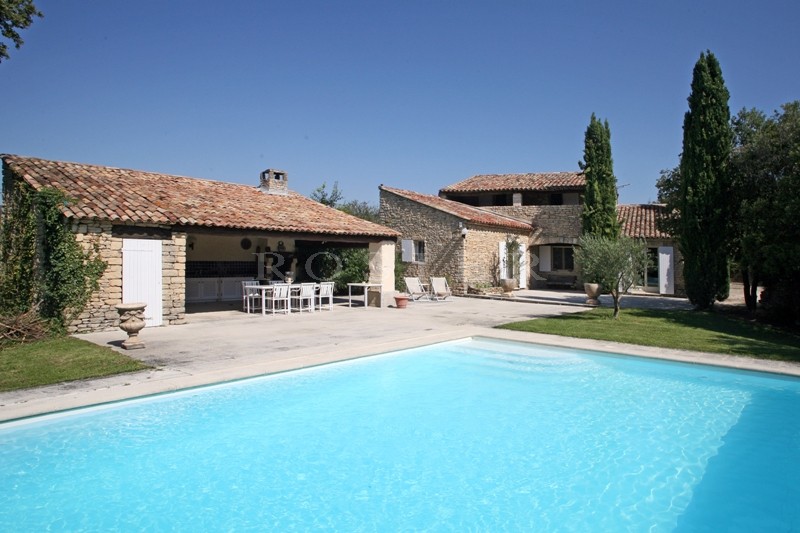 Gordes, for sale, house with a garden, terraces, swimming pool and pool house