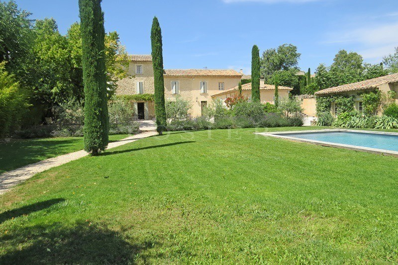 For sale, in the Luberon by ROSIER; in a lovely village, beautiful old farmhouse with outbuilding, large sunny terrace, landscaped garden and swimming pool