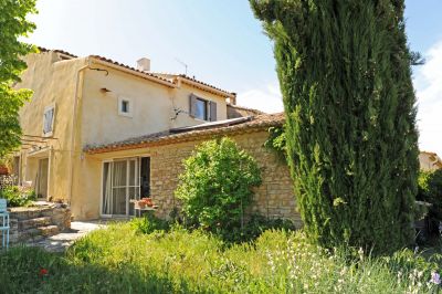 In Provence, near Gordes, Roussillon and Goult, for sale, charming hamlet house with a view and a garden overlooking the countryside