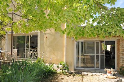 In Provence, near Gordes, Roussillon and Goult, for sale, charming hamlet house with a view and a garden overlooking the countryside