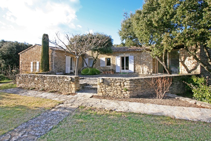 For sale in Luberon, a U-shaped family home, south facing, with outbuildings and pool and offering superb views of the valley and the Luberon