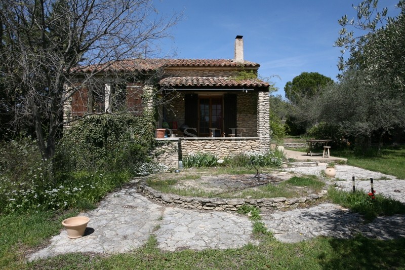Gorde, close to the centre of the famous Luberon hilltop village, for sale, one storey stone house with a large garden