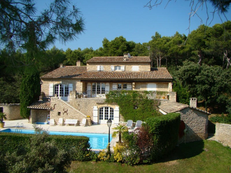 For sale on the Luberon, large stone house on a park of an hectare and swimming pool