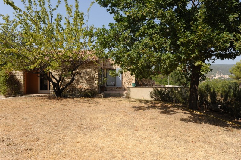 For sale, in the Luberon Regional Park, stone house with pool, garden and views over the valley