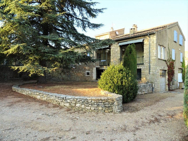 In Luberon, bastide shape stone house with inner swimming pool